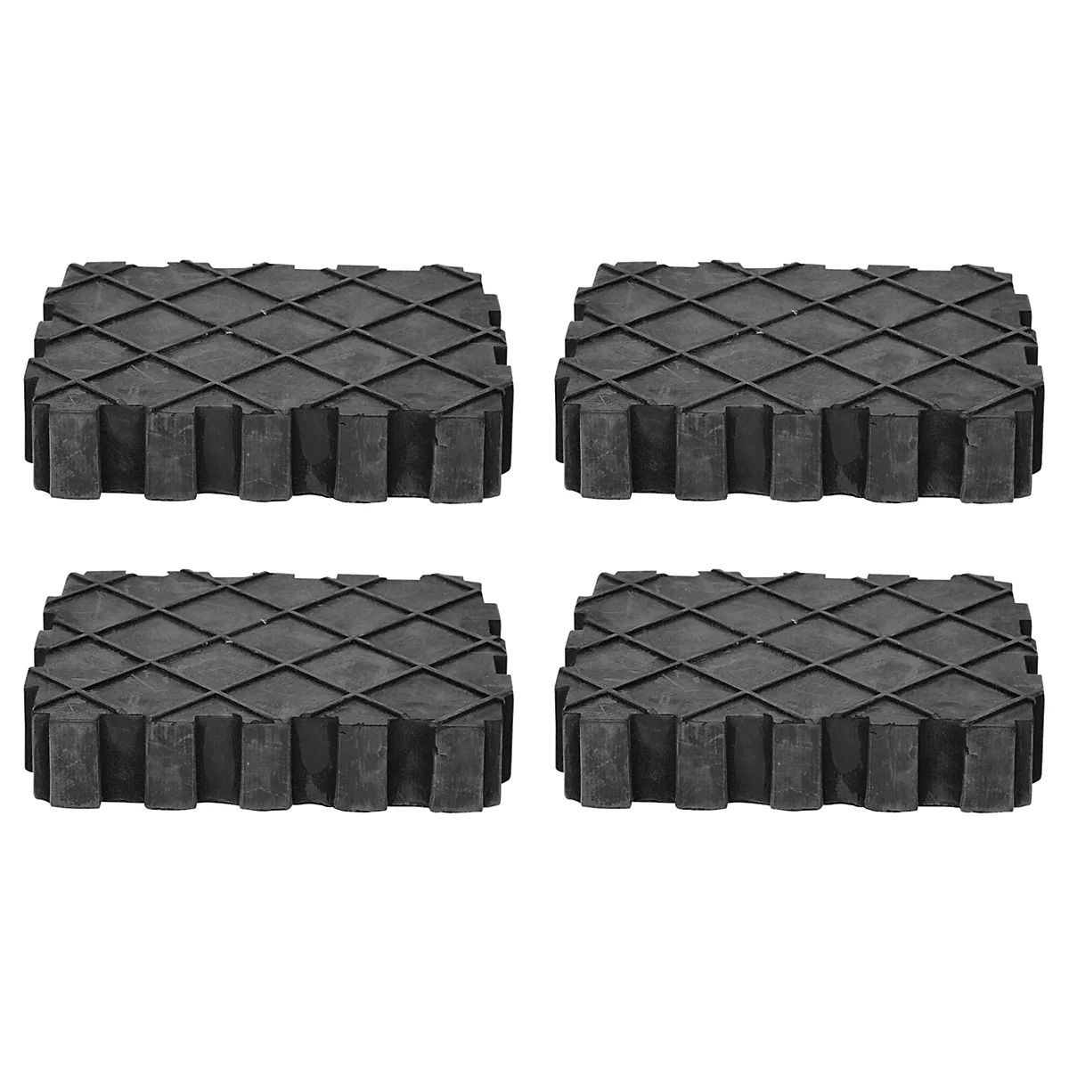 Vier schwarze, rechteckige Gummipads mit Wabenmuster.